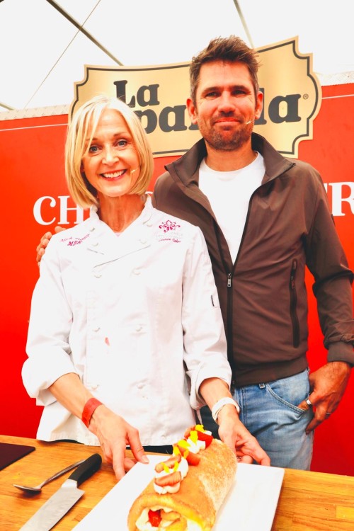 Scouting for Swirls - Mich and Roy at Foodies Festival with a lemon and strawberry roulade